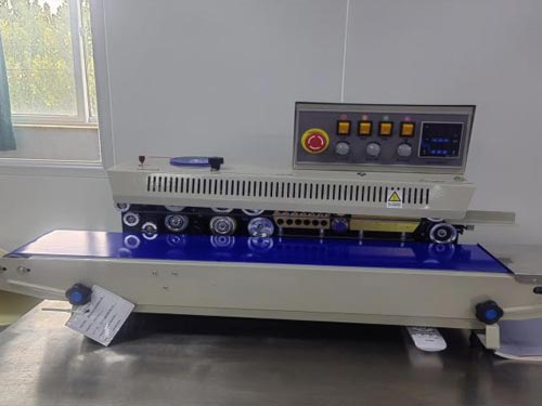 Vertical sealing machine, continuous sealing machine